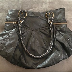 black zippered shoulder bag